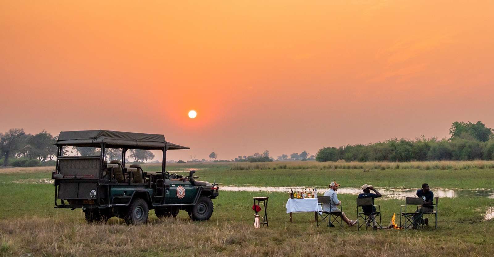 Nat Hab guests, Nat Hab’s Explorer Camp, Okavango North, Okavango Delta, Botswana. 